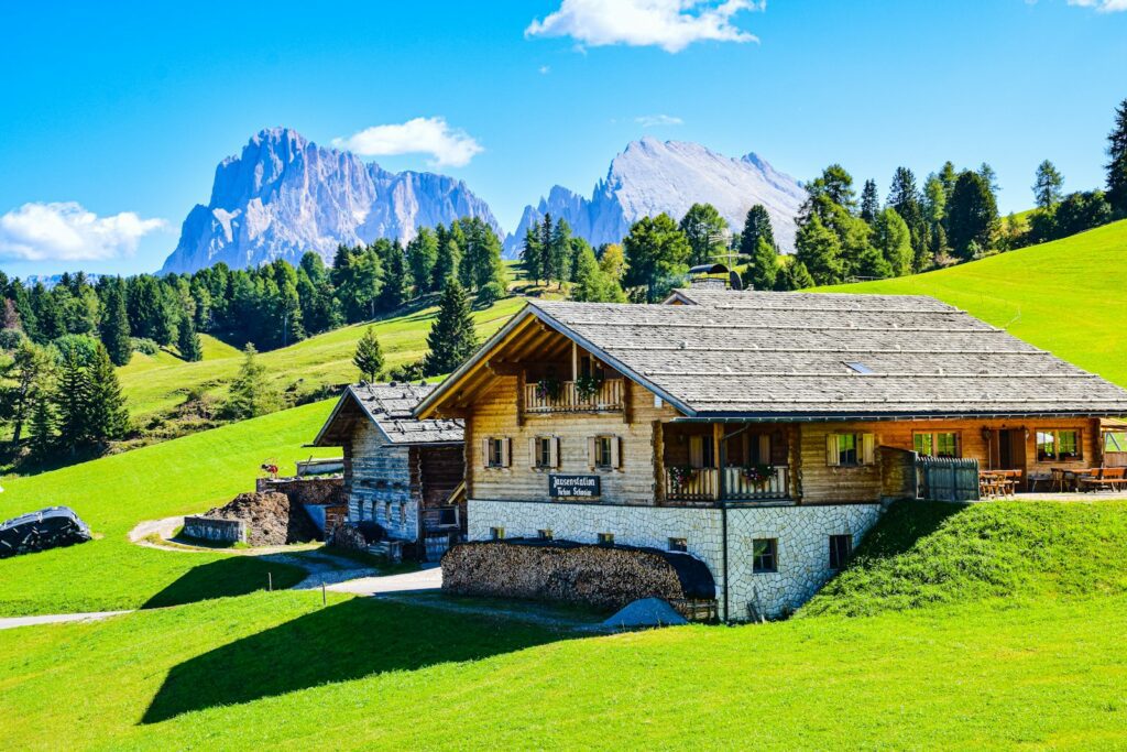 a house with a mountain in the background