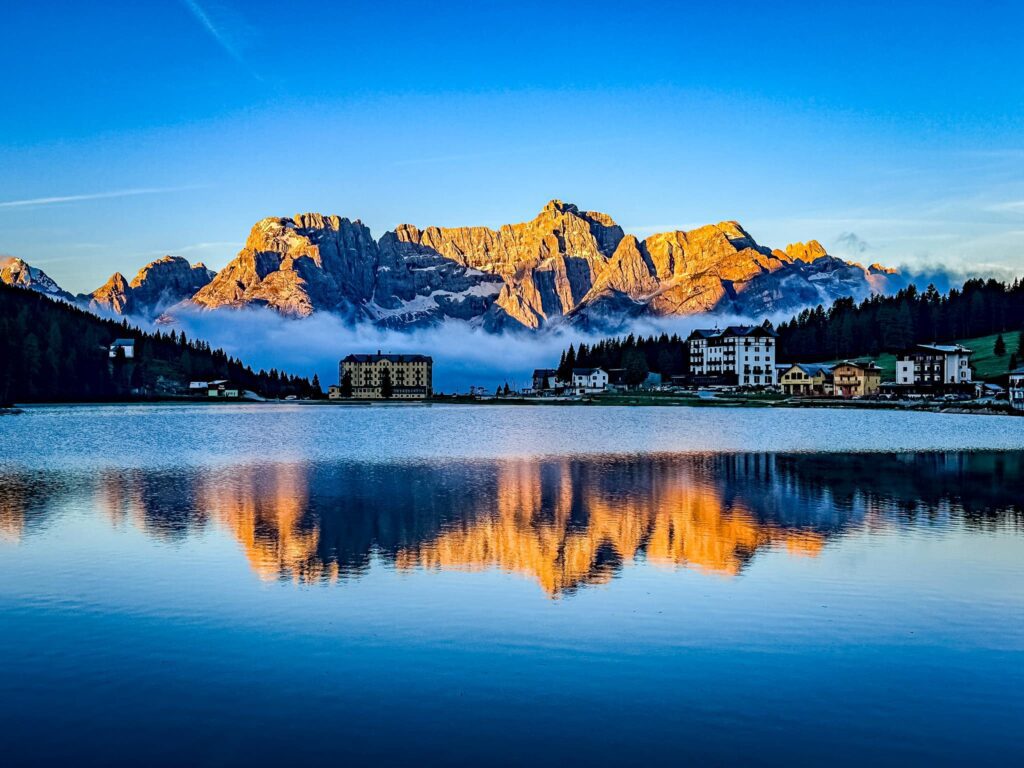 Breathtaking Tranquil Sunrise Reflection of Lake Misurina