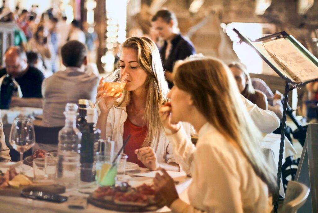 Woman Eating Bruschetta Oakland dinner